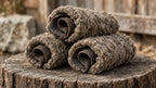 Hero stack of sheep skin jerky rolls on stump