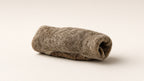 Sheep skin jerky roll clean white catalog photo
