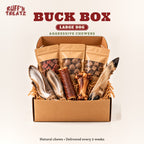 Ruff'n Treatz Buck Box for large dogs: 3 organ and Buck Ball bags, 2 deer ears, a large skin roll, a meat bone and a deer leg