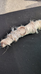Close-up of Goat Hide Jerky Rolls all-natural dog chews
